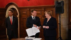 Macron’dan Merkel’e büyük jest