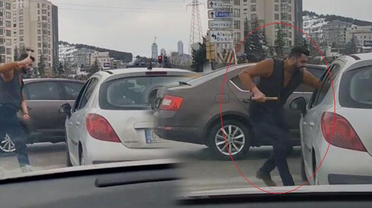 Kırmızı ışıkta geçtiği için uyarılınca çekiçle saldıran sürücü adliyede
