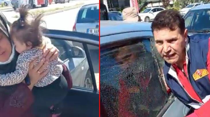 Otomobilde mahsur kalan bebeği itfaiye kurtardı