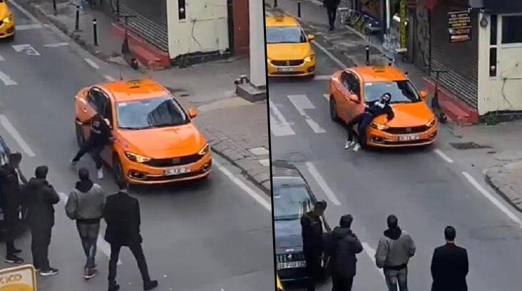 Yer: Beyoğlu! Araçların önünü kesti, taksinin kaputunun üzerine yattı